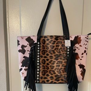 Animal print faux leather tote embellished with rhinestone studs and fringe.